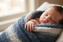 Load image into Gallery viewer, Baby with hand on Rowan Jeans blanket